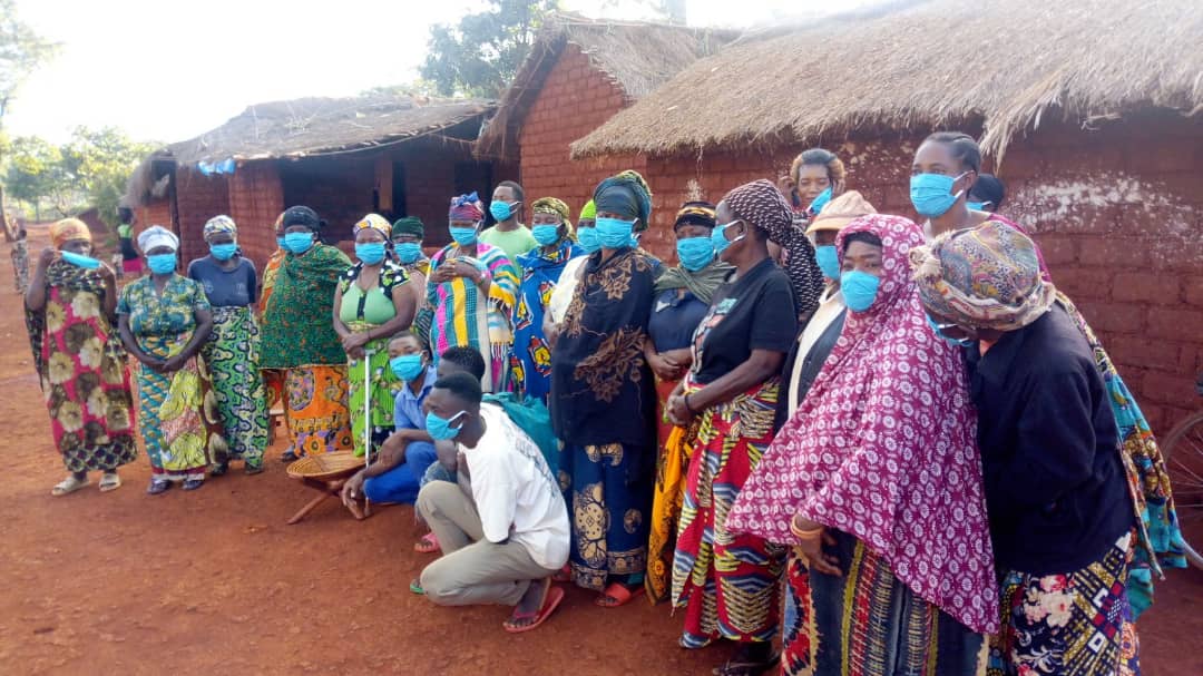 Nyarugusu Refugee Camp residents wearing masks provided by the Protecting Hope Project from Equipping Hope International in Tanzania.