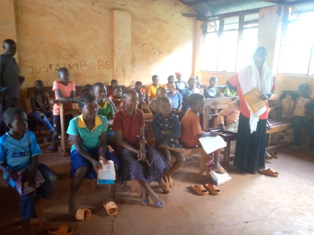 Children at Nyarugusu Refugee Camp in Tanzania learning English through Equipping Hope's Teaching Hope program