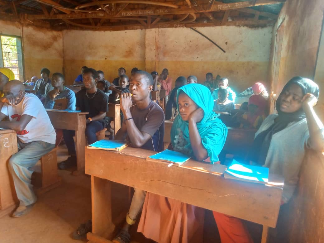 Students learning English in a Business of Hope class through Equipping Hope International. Nyarugusu Refugee Camp, Tanzania